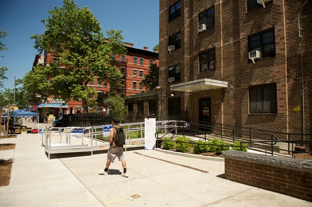 The Mary McLeod Bethune Gardens Community Center entrance with polling signage everywhere and an accessible ramp. How ADA Standards shape access at US public gardens and what to check first