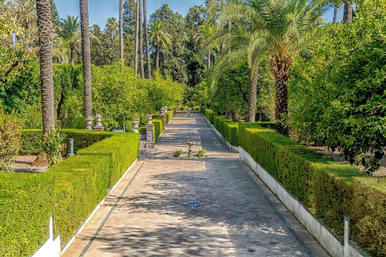 seville, spain, alcazar of seville, garden, walkway, hedge, trees, palms, palm trees, grass, nature, outside, seville, seville, seville, seville, seville, hedge. How National Register listing changes a historic garden visit, and what it does not